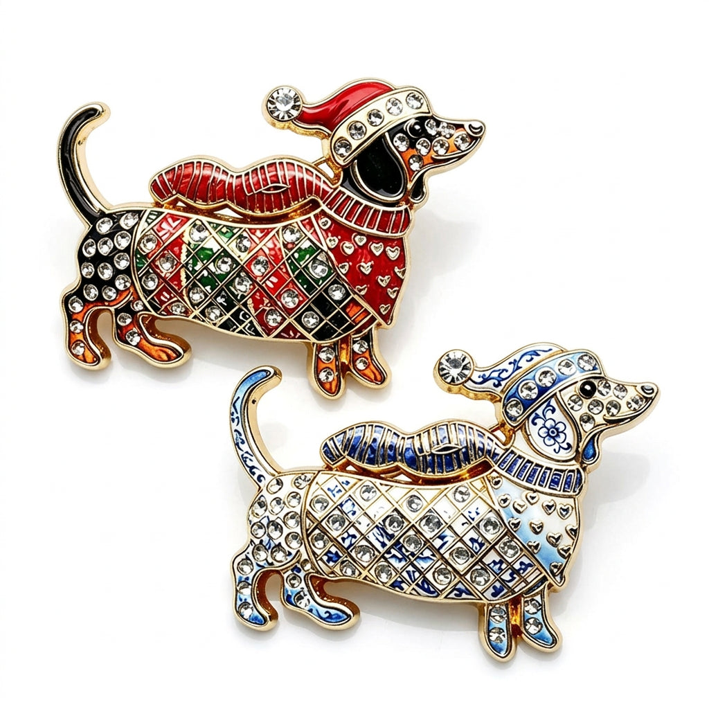 Two dachshund-shaped holiday pins with rhinestone embellishments, one wearing a red sweater and Santa hat, the other wearing a blue sweater and hat, displayed on a white surface against a light blue background.